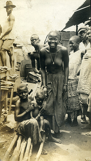 Photograph of young woman and two young boys in Liberia